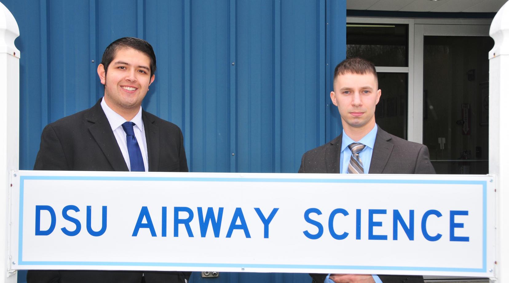 The 4.0 academic performance of (l-r) Edgar Ortiz and Kirk Prange was the first time two Aviation majors have completed their undergraduate journey with a perfect GPA.