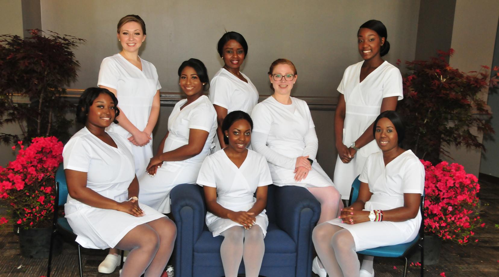 <p>DSU Department of Nursing's Class of 2018: (l-r) Alexis Sudler, Idalis Stamas, Breanna Clinton, Jadidah Gatheri (standing), Emmanuella Che (seated), Katherine Groves, Kayla Nelson and Mary Muthini.</p>