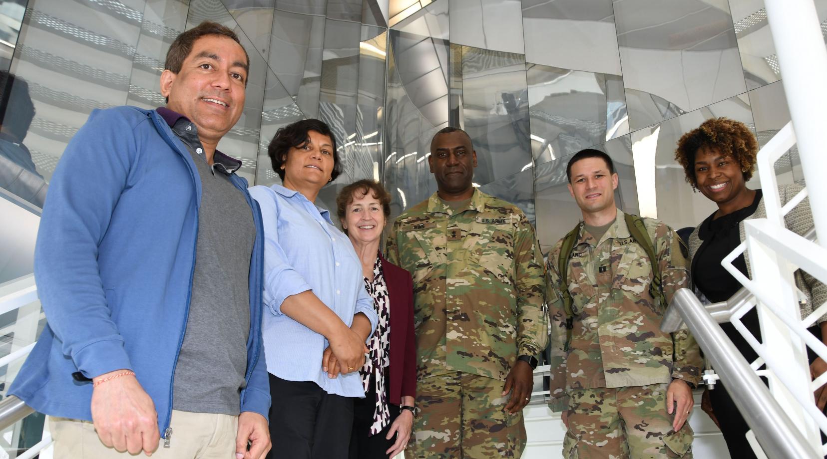 (L-r) DSU's Dr. Gour Pati, Dr. Renu Tripathi, Dr. Melissa Harrington with Maj. Gen. Cedric Wins, commanding general of the U.S. Army Research Development Engineering Command, along with his staff Capt. Joshua Blanc and Dr. Patrice Collins, who earned her Ph.D. at DSU.