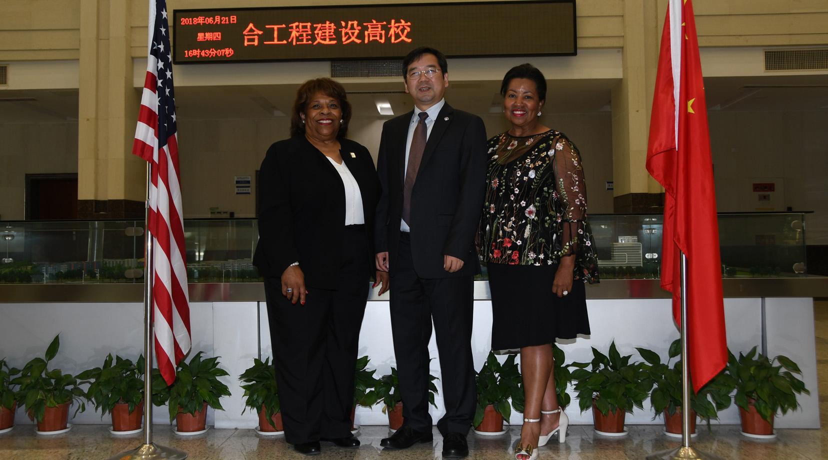 <p>From left are DSU President Wilma Mishoe, NBUT President Lyn Zhongda and DSU Board of Trustees Chairperson Devona Williams.</p>