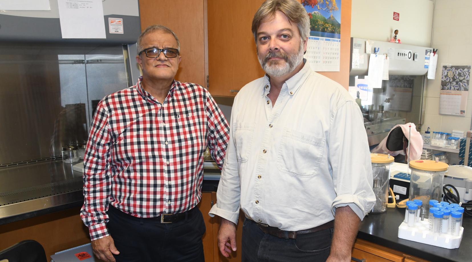 Dr. Aristides Marcano (l), Professor of Physics and principal investigator of the grant, will collaborate with Dr. David Kingsley of the Food Safety Lab on campus on laser research that could lead to improvements in the way foods and biologicals are sanitized.