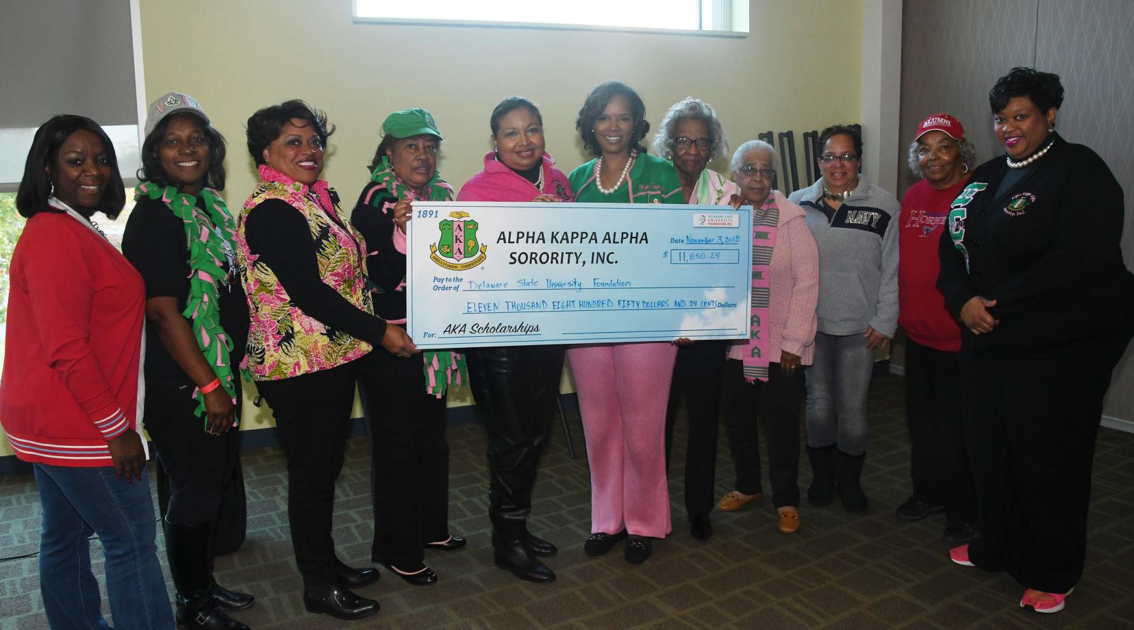 Alpha Kappa Alpha members representing Delaware chapters in Wilmington, Newark and Dover, came together to present a scholarship donation of more than $11,850 to the University.