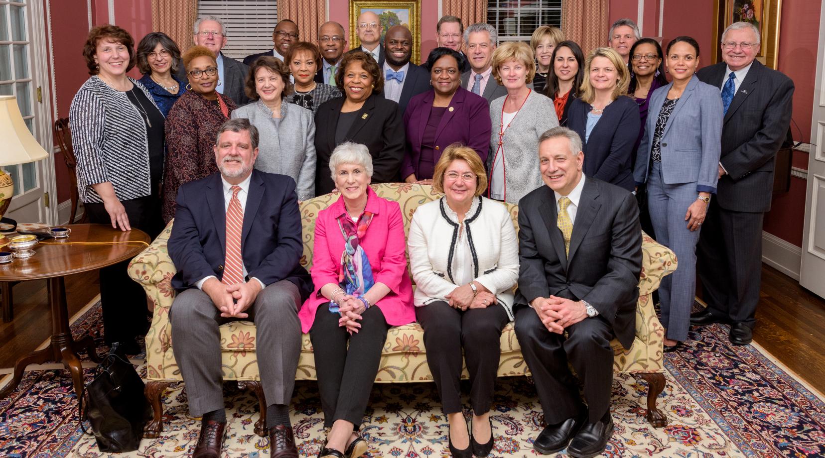 University President Wilma Mishoe and Provost Tony Allen (both in standing center) pose with other presidents and administrators whose institutions are a part of the Campus Compact Mid-Atlantic. During a Nov. 8 ceremony, the Compact presented Dr. Allen with its Civic Leadership Award.