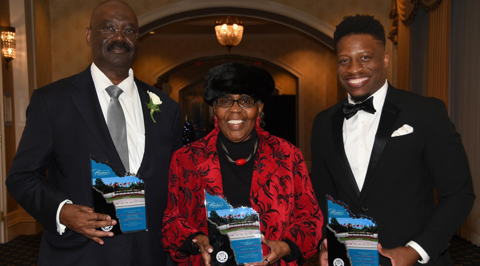 The 2018 President's Scholarship Ball's University Partners Award recipients: (l-r) Bennie Smith, Marion E. Gibbs and Blake R. Saunders.