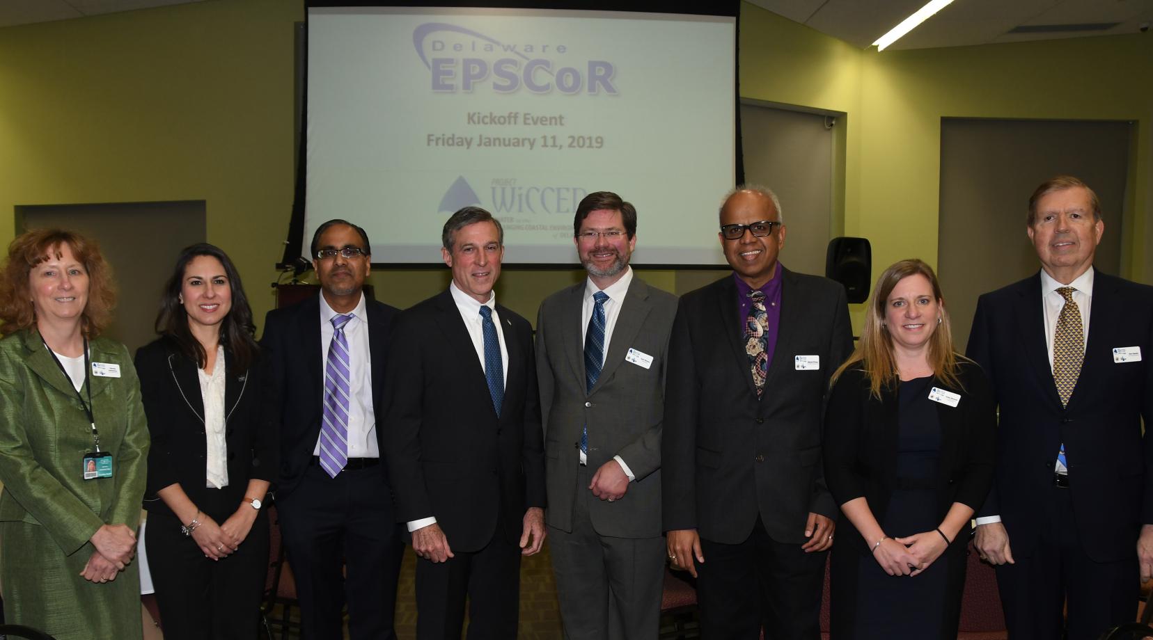 Delaware EPSCoR leadership: (L-r) Martha Hofstetter, DTCC Institutional Lead; Justina Sapna, DTCC VP for Academic Affairs; Venu Kalavacharla, DSU Institutional Lead and Co-PI; Gov. John Carney; Kent Messer, Project Director, and PI; Malcolm D’Souza, Wesley Institutional Lead, and Co-PI; Holly Michael, Research Lead and Co-PI; Donald Sparks, Delaware EPSCoR Director, and Co-PI.