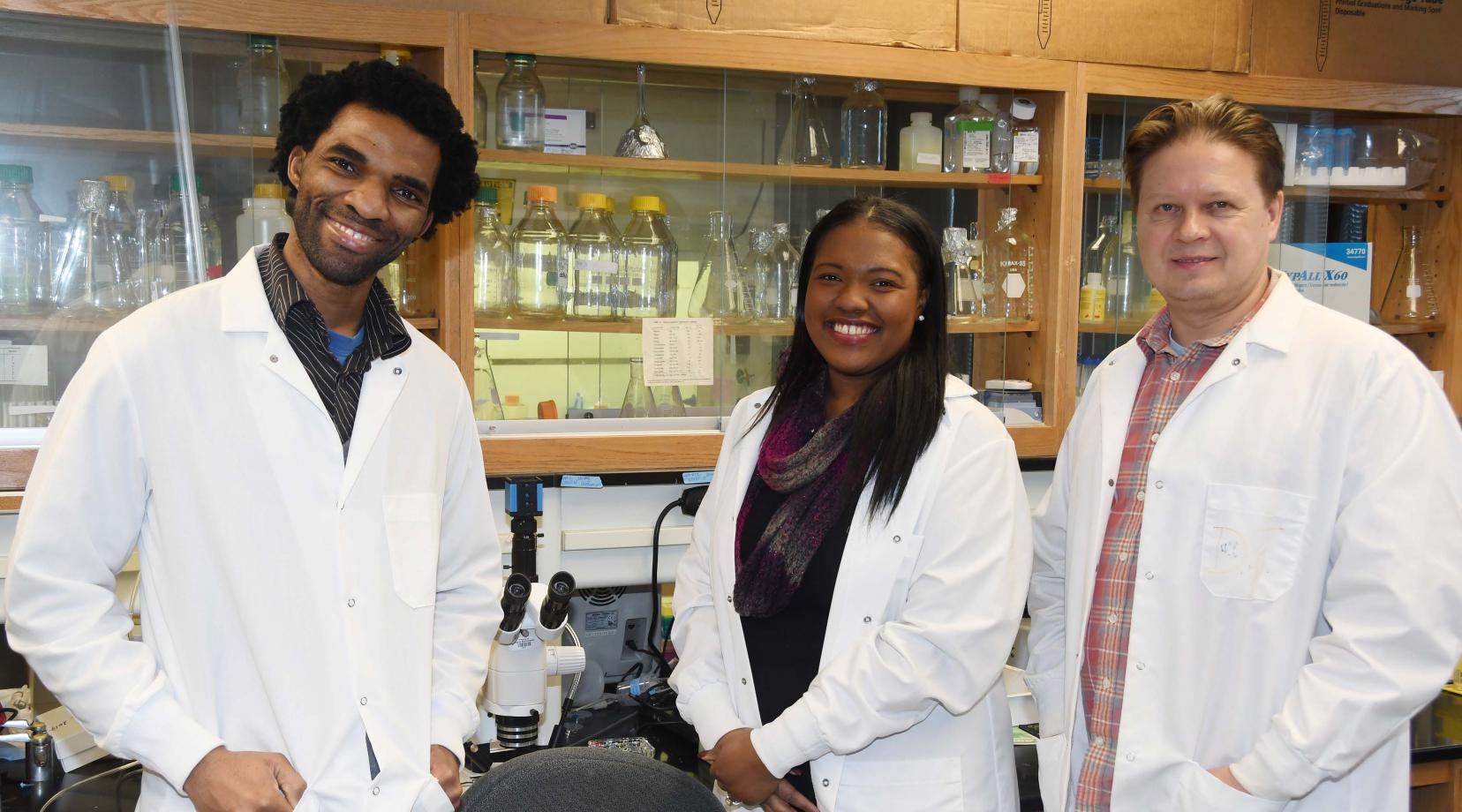 (L-r) Dr. Hakeem Lawal, associate professor of biological sciences, and the awardees Shardae Showell and Sergei Grigoryev, both first-place winners in their respective categories. Not pictured is a third-place winner, Liam Joseph.