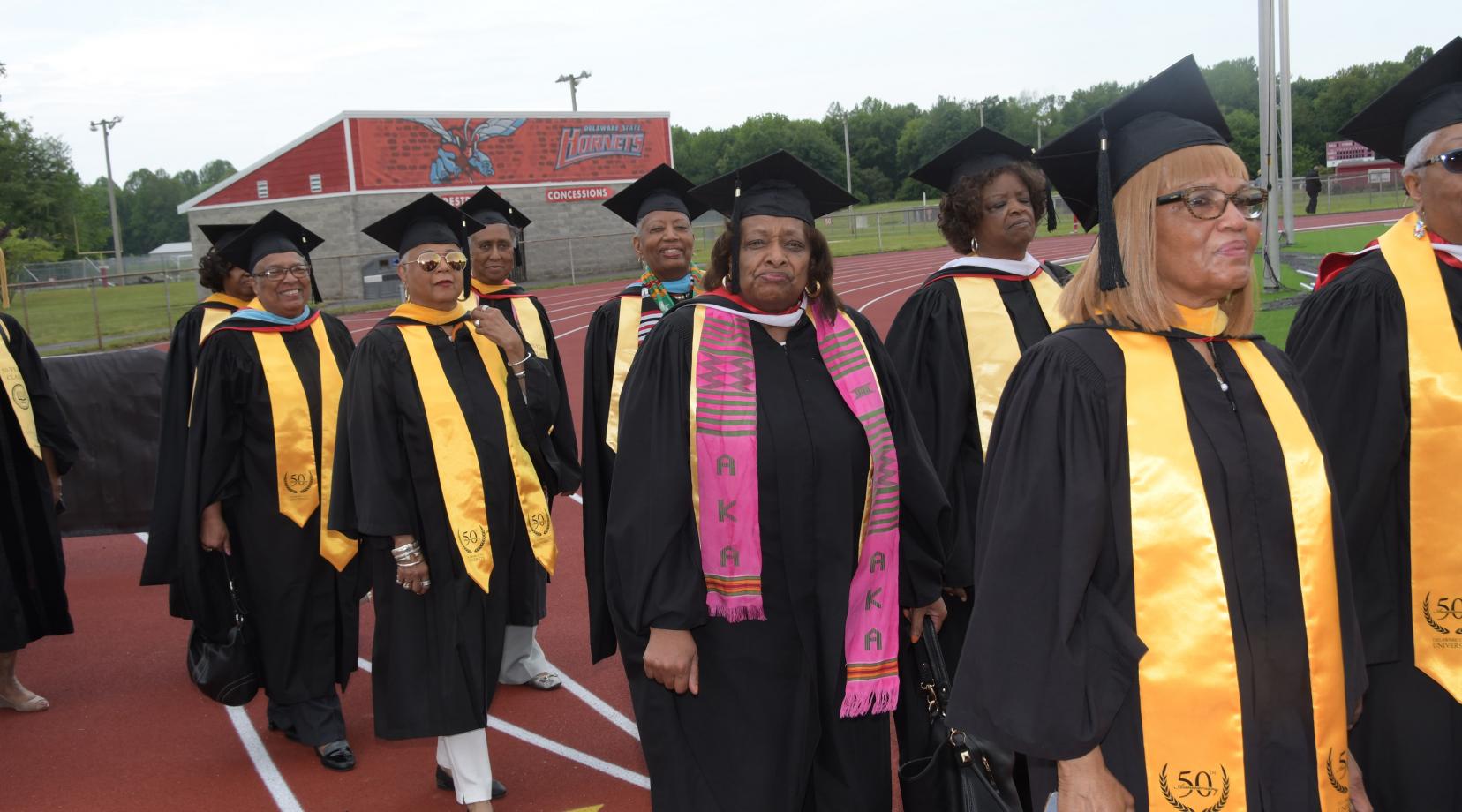 The Class of 1969 march out onto Alumni Stadium to take part in the May 11 Commencement Ceremony.