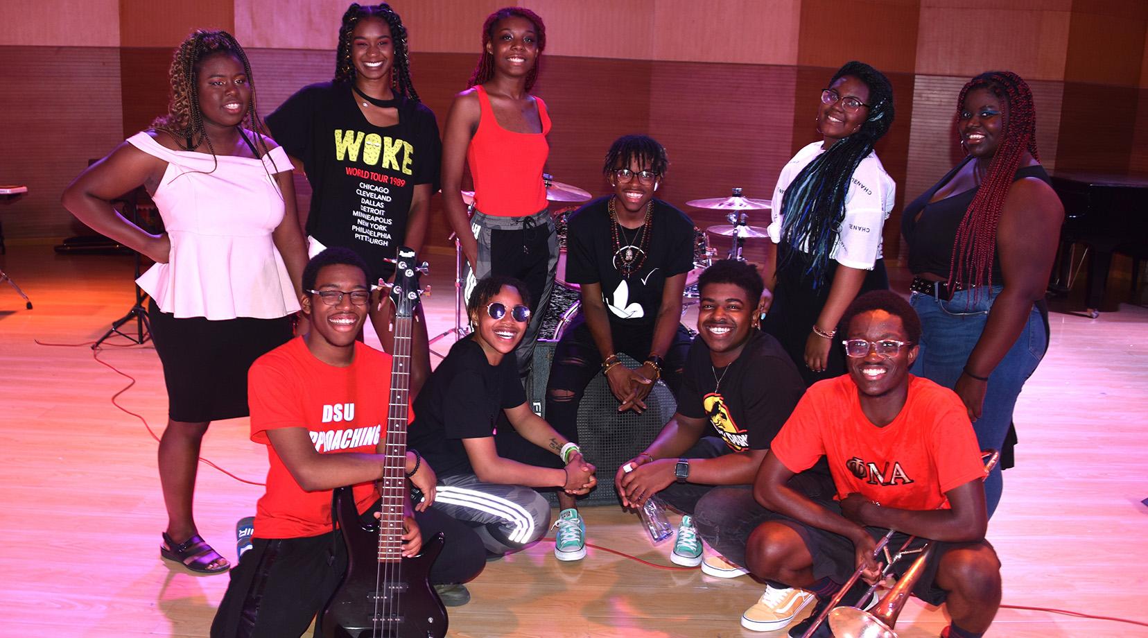 <p>Members of the DSU Popular Music Ensemble are: (kneeling l-r) Kamin Clark, Imani Sulleman, Issachar Scroggins and Glamu Kpov; (standing l-r) Chloe Humphrey, Aishah Bradley, Beauty Marsh, Davyn Parham, Nireh Traylor and Mozella Matthews.</p>