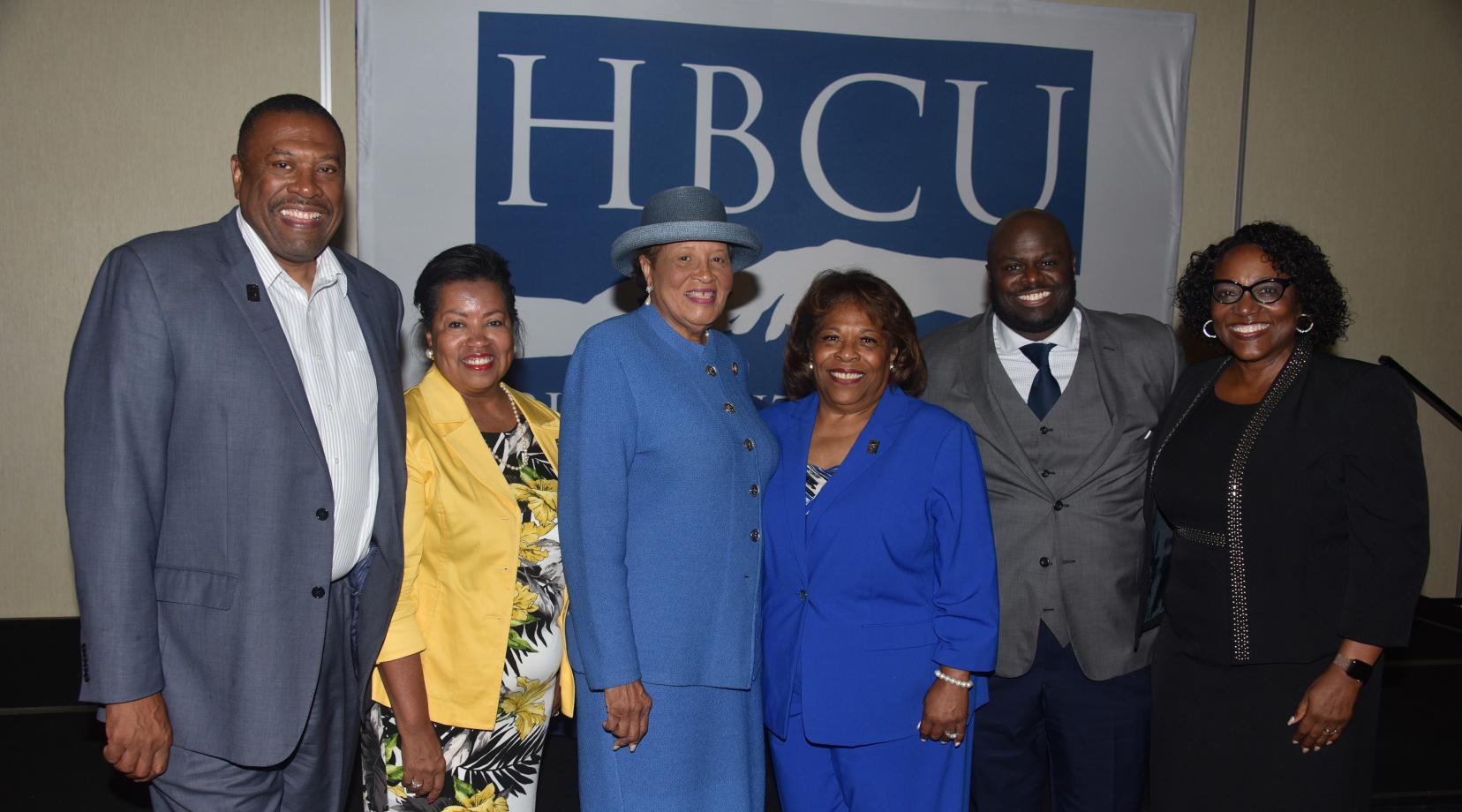 <p>(L-r) John Ridgeway and Dr. Devona Williams, University Board vice chair and chair, respectively, keynote speaker U.S. Rep. Alma Adams, University President Wilma Mishoe, Provost Tony Allen, and Dr. Vita Pickrum, vice president of Institutional Advancement, take a photo moment at the 9th annual Philanthropy Symposium hosted by Delaware State University.</p>
