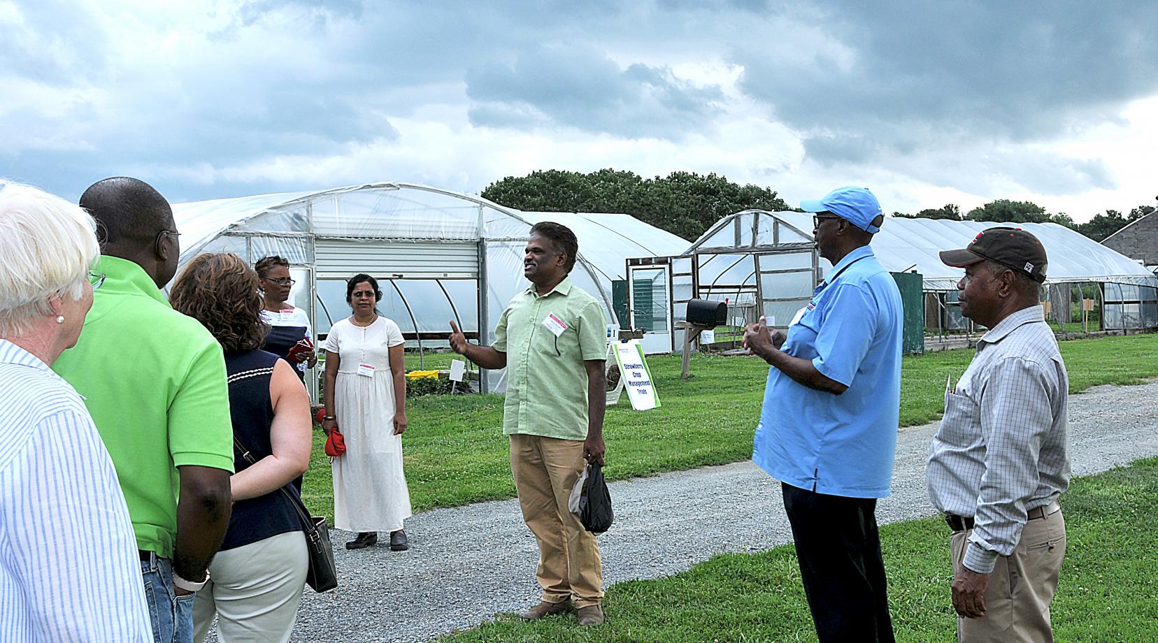 Dr. Sathya Elavarthi, associate professor of agriculture, talks about his hemp research during the Board of Trustees and Administrative Council's visit to the Outreach and Research Center in Smyrna.