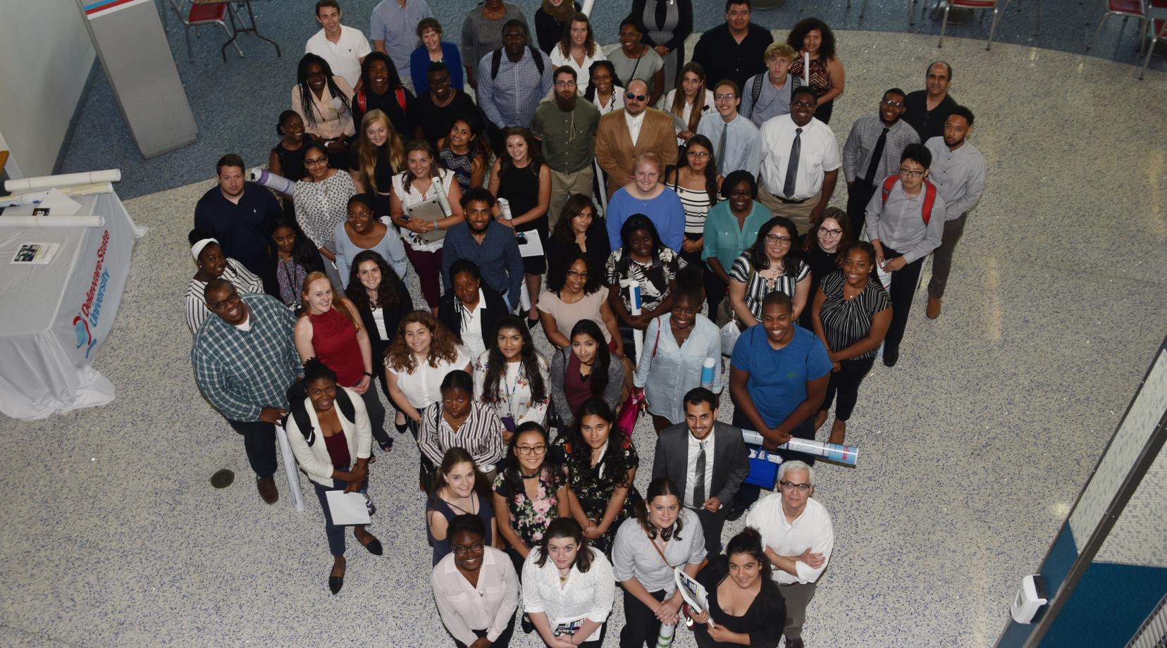 The 2019 Summer Research Symposium participants pose for a group shot at the end of the July 26 event.