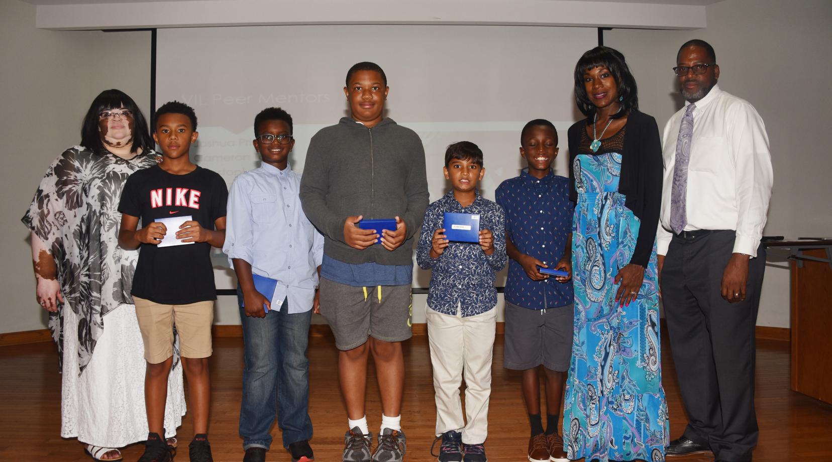 <p>The Verizon Summer Camp's 1st place team -- The Thinkers. (L-r Dr. Charity Shockley, camp director; Thinker team members Xavier Gordy, Christian Auguste, Tristan Cooper, Vraj Shah and Kinte Tolson; and camp co-directors Lillie Crawford and Vaughn Hopkins.</p>