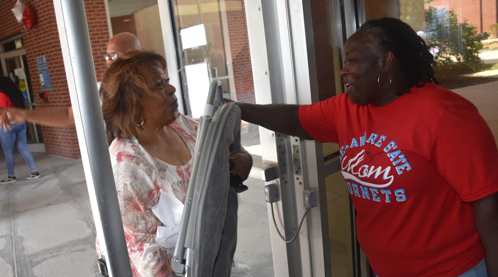 University President Wilma Mishoe even got into the volunteer work of helping students and the families move their belongings into the residential halls.