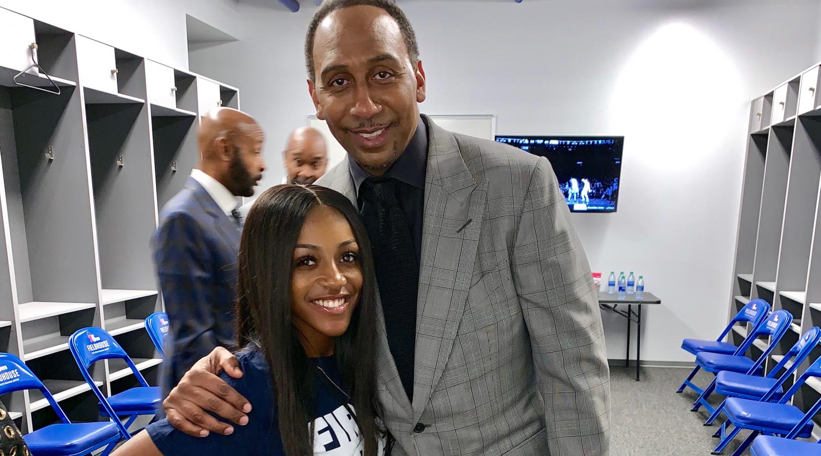 SGA Vice President Ashlee Davis gets a photo op with Stephen A. Smith, ESPN commentator, who broadcasted his morning show live at the 76er Fieldhouse as part of Wilmington's HBCU Week activities.