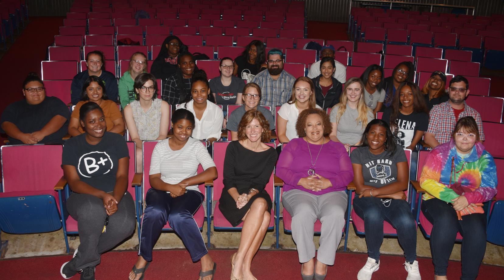 Dana Bowe (center front, black dress), 2019 Delaware Teacher of the Year, seated next to Dr. Crystal Timmons, director of Clinical and Field Experiences, poses with the education majors she shared her teaching experiences with on Sept. 25 in the Education and Humanities Theatre.