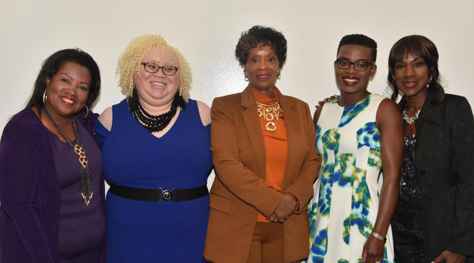 (L-r) Dr. Devona Williams, DSU Board of Trustees chairperson, Sara Crawford-Jones, director of the Women's Business Center, of True Access Capital, Audrey Scott-Hynson, owner of A. Scott Enterprises, Linda Arrey keynote speaker, and Lillie Crawford, event organizer, gather for a photo during the Women's Entrepreneurship Week observance at the University.