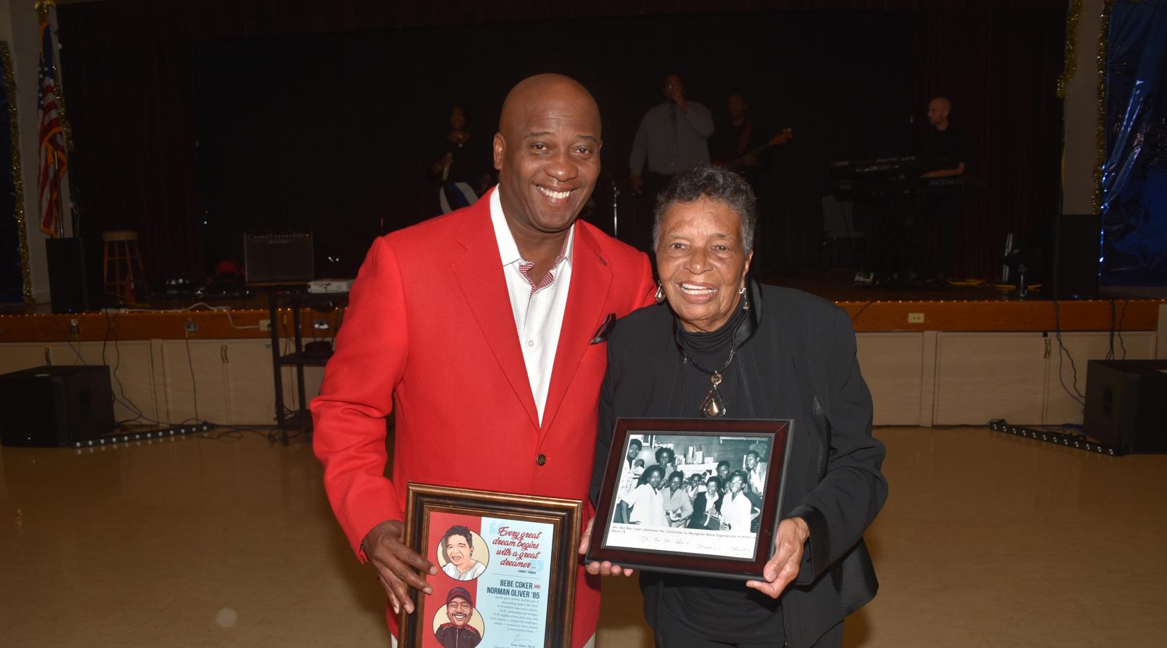 Norman Oliver and Dr. Bebe Coker each received the Early College High School's Honoring Our Legacy Award during the charter school's Oct. 25 annual fundraising dinner.