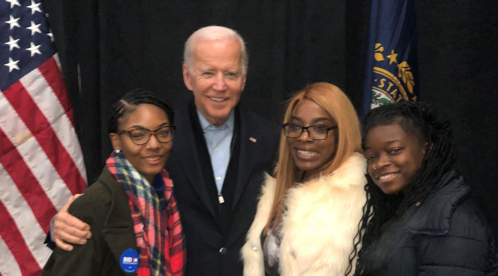 <p>Presidential candidate and former Vice President Joe Biden pose with Delaware State University students (l-r) Da’Vonne Duncan, Folasade Olugbuyi, and Kendra Hand, who visited New Hampshire to experience the campaign environment.</p>