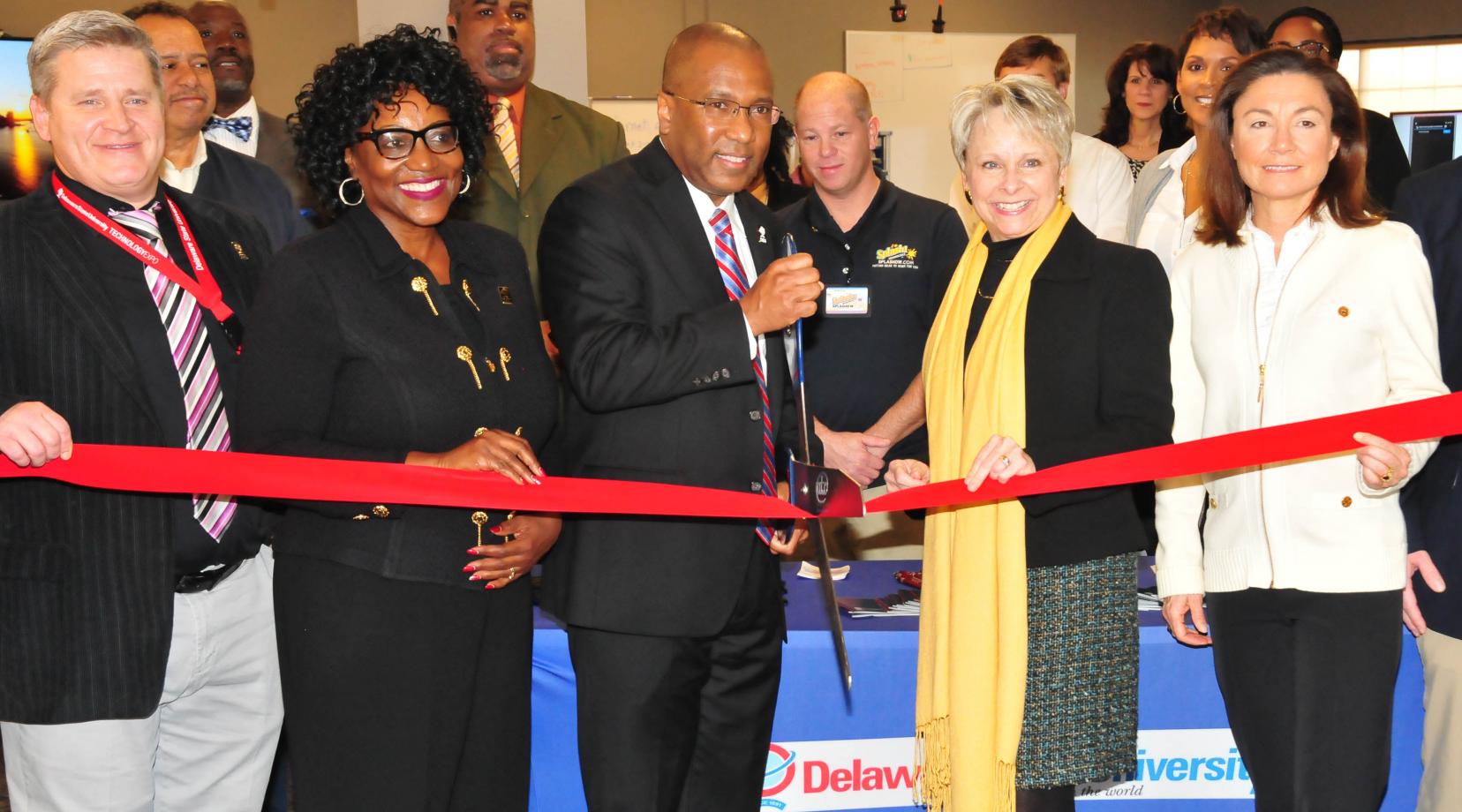 Ribbon Cutting Ceremony for the DSU Training and Technology Center – (L-r) Dee Myers, DTTC director; Dr. Vita Pickrum, DSU vice president of Institutional Advancement; DSU President Harry L. Williams; Judy Diogo, president of the Central Delaware Chamber of Commerce and Jocelyn Stewart, Barclaycard U.S. senior director of Community Relations.