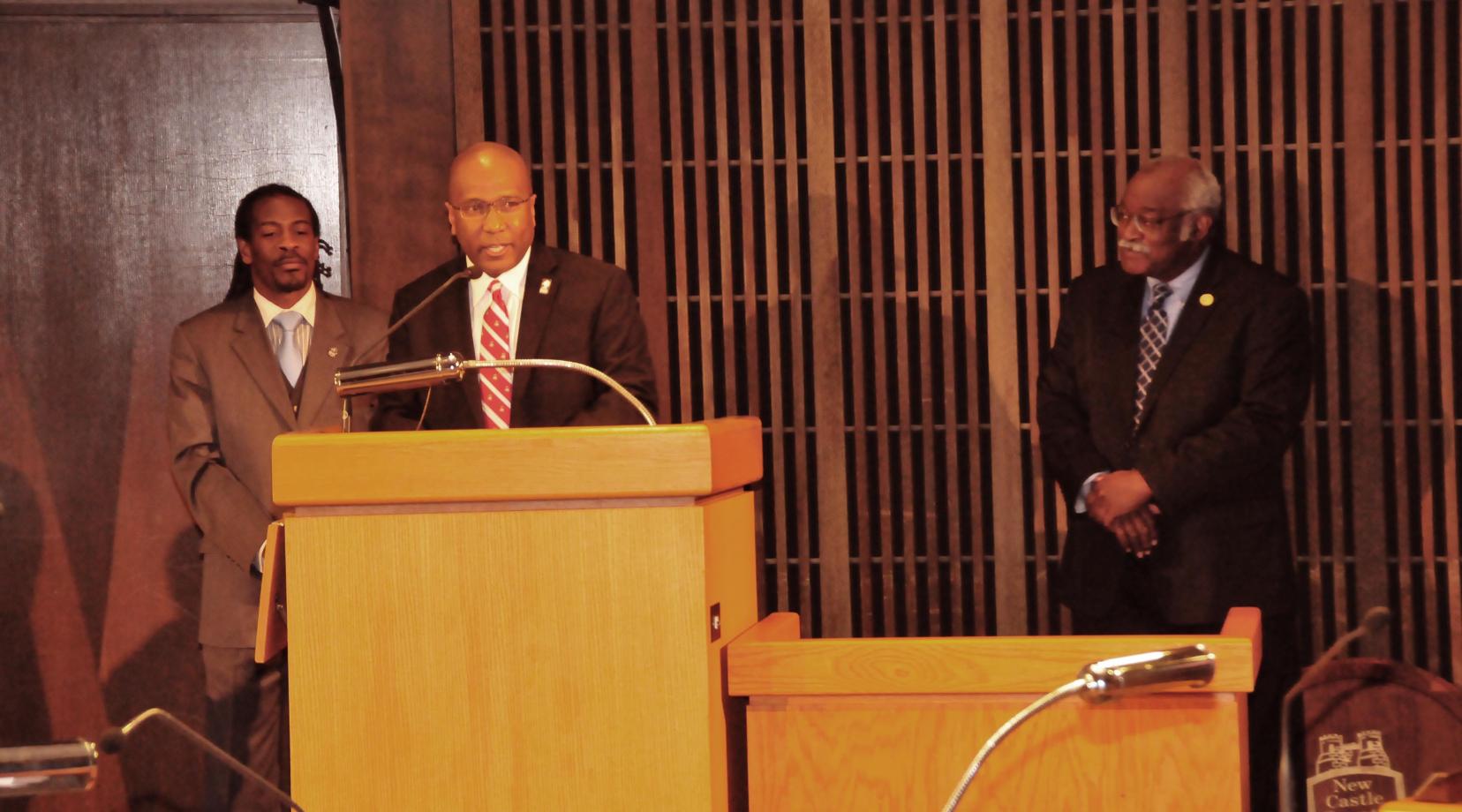Dr. Harry L. Williams expresses his gratitude to the Wilmington City Council for its unanimous resolution honoring him. Flanking him are Councilman Nnamdi O. Chukwuocha and Councilman Sam Guy, both DSU alumni, Class of 1996 and Classes of 1981 and 1984, respectively.