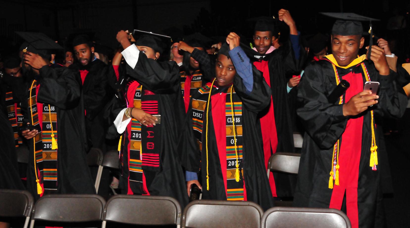 DSU Class of 2017 graduates turn their tassels to the other side at the end of the Dec. 16 Commencement Ceremony