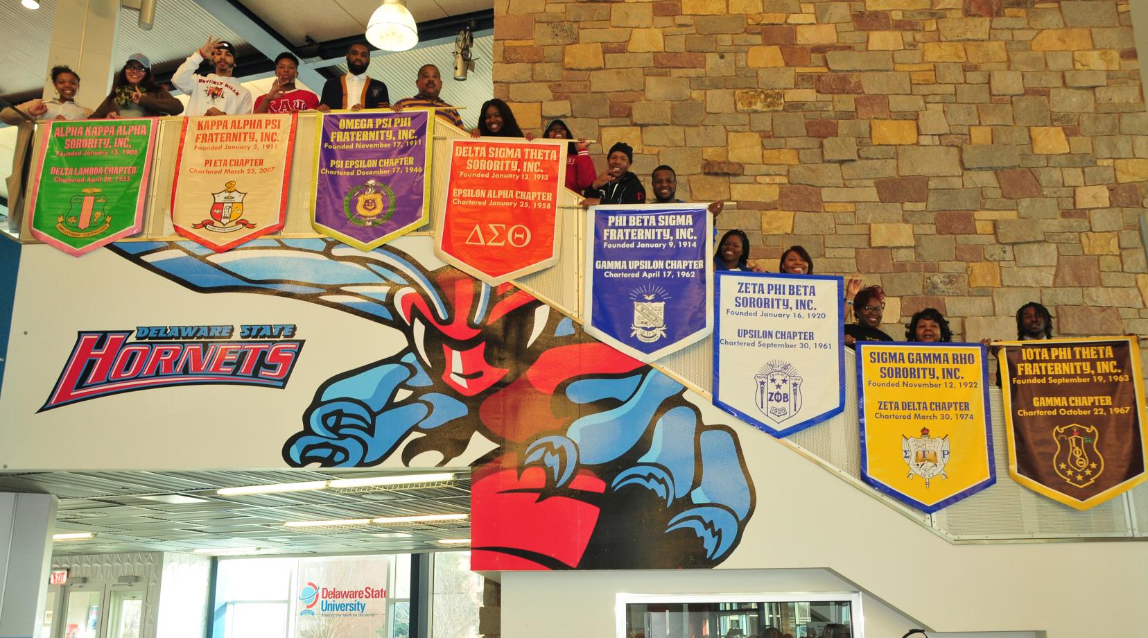 The Divine Nine fraternities and sororities show off their banners that will be hung in the MLK Jr. Student Center.