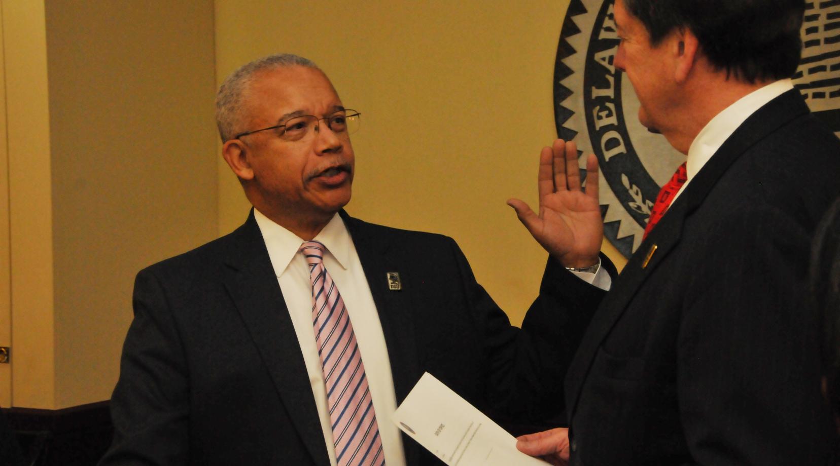 Norman D. Griffiths is sworn in as a new trustee by Tom Preston, interim general counsel, during the DSU Board of Trustees' Jan. 30 public meeting.