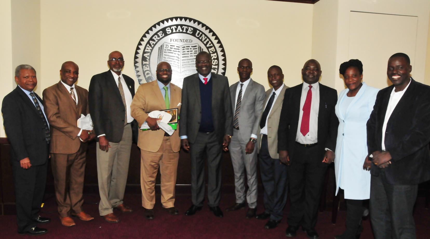 (L-r) Dr. Marikis Alverez, Dr. Samuel Besong, Dean Dyremple Marsh, Provost Tony Allen, Gov. Cornel Rasanga, along with his delegation, Walter Okello, Charles Ogada, Hon. Nick Ochula, Pauline Precious and Anthony Omondi.