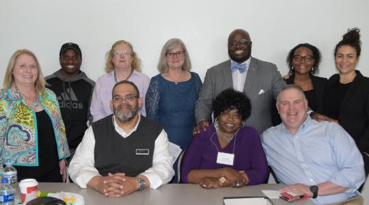 <p>Poverty Symposium leaders: (seated l-r) Bruce Wright and Bernice Edwards of First State Community Action, state Sen. Colin Bonini; (standing l-r) Cynthia Pritchard of Philanthrophy Delaware, University student Rex Haye, University Social Work Dept. chair Dr. Kelly Ward, University Psychology Dept. chair Dr. Dorothy Dillard, Provost Tony Allen, keynote speaker Lillian Singh and Kat Goughnour, both of Prosperity Now.</p>
