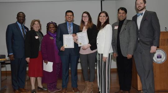 <p>(L-r) Dr. Daniel Awodiya, Dr. Myna German, Ava Perrine, newly inducted Lambda Pi Eta inductees Eddi Cabrera and Samantha Carter, Renee Marine, Maneesh Pandeya and Zak Kimbell. Mr. Cabrera and Ms. Carter were inducted in the honor society during the final session of MCVPA Day.</p>
