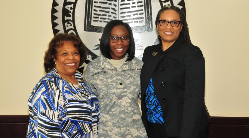 <p>Alisha Winchester (center), a junior English major, stands with DSU Acting President Wilma Mishoe (l) and Dr. Adenike Davidson, professor of English. Just before the photo, Dr. Mishoe informed Ms. Winchester, also a ROTC cadet, that she has been awarded the prestigious Harry W. Truman Scholarship.</p>
